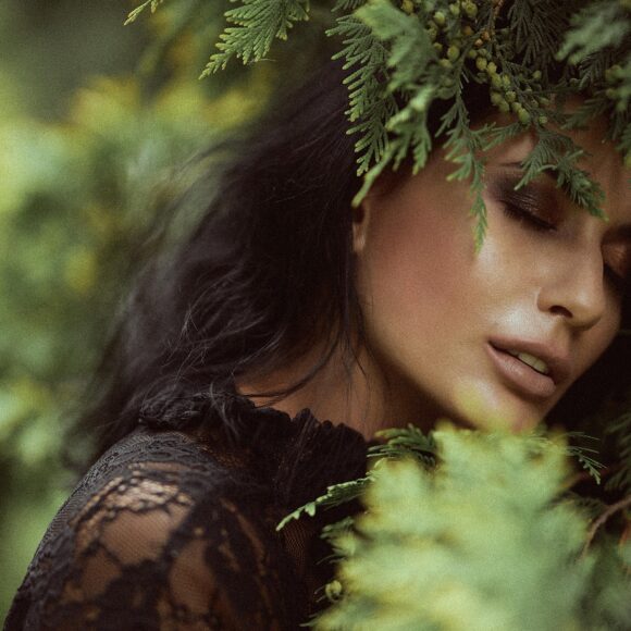 Woman with glowing skin representing the gut-skin connection and microbiome wellness