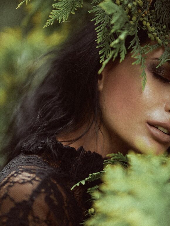 Woman with glowing skin representing the gut-skin connection and microbiome wellness