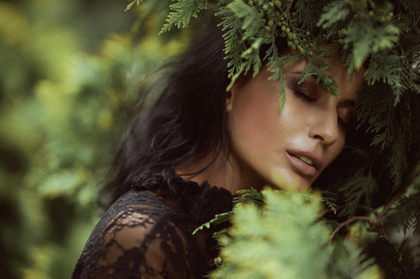 Woman with glowing skin representing the gut-skin connection and microbiome wellness